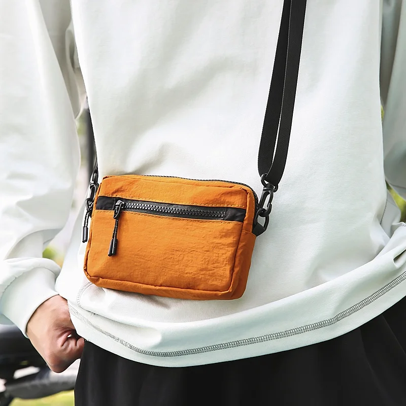 bolsa-transversal-casual-e-moderna-em-tecido-ox-bolsa-portatil-para-celular-versatil-moda-primavera-verao-para-jovens