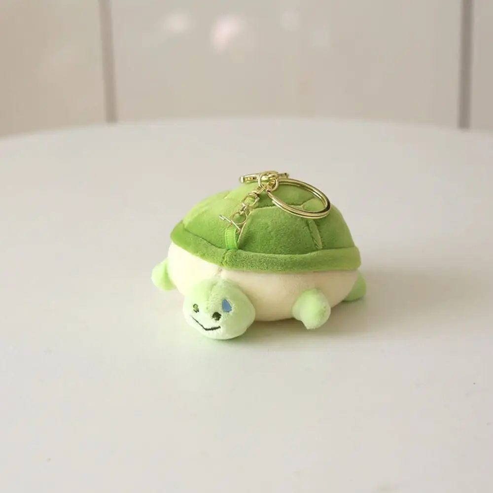 Nuevo llavero de muñeco de tortuga de dibujos animados, pequeño colgante creativo de bolsa de tortuga de peluche, llavero de coche de 10 cm, regalos