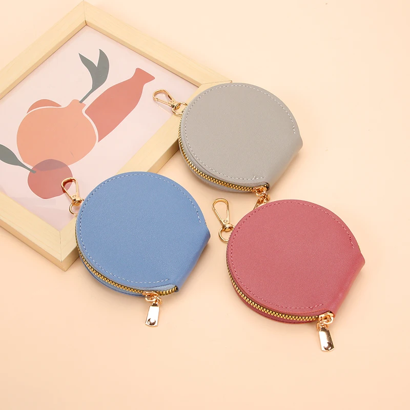 Cute mini Round PVC Coin Purse with Zipper Hook. Store Coins, Keys, Earbuds and Tiny Accessories. Lightweight for Daily Carry.