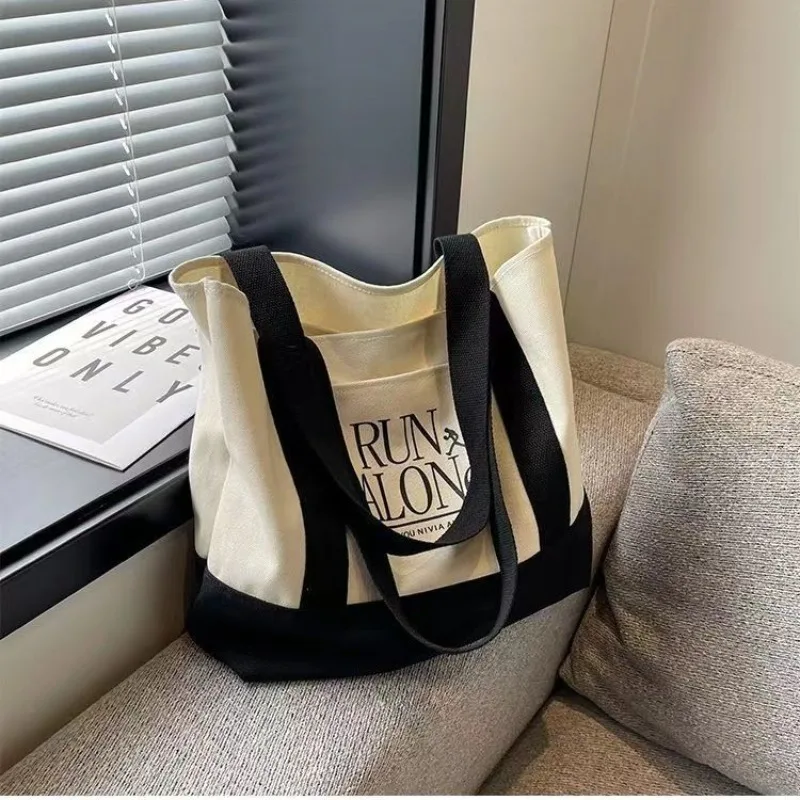 1pcs new canvas bag women's new simple and stylish large-capacity shoulder bag Joker Korean commuter handbag