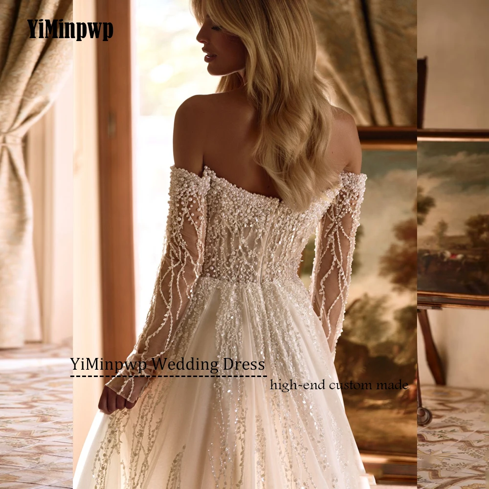 Abiti da sposa con perline personalizzati 2025 Abito da sposa di lusso a maniche lunghe con scollo a cuore senza schienale Abito da sposa principessa A-Line in tulleAbiti da sposa personalizzati a perline 2025 lusso ma