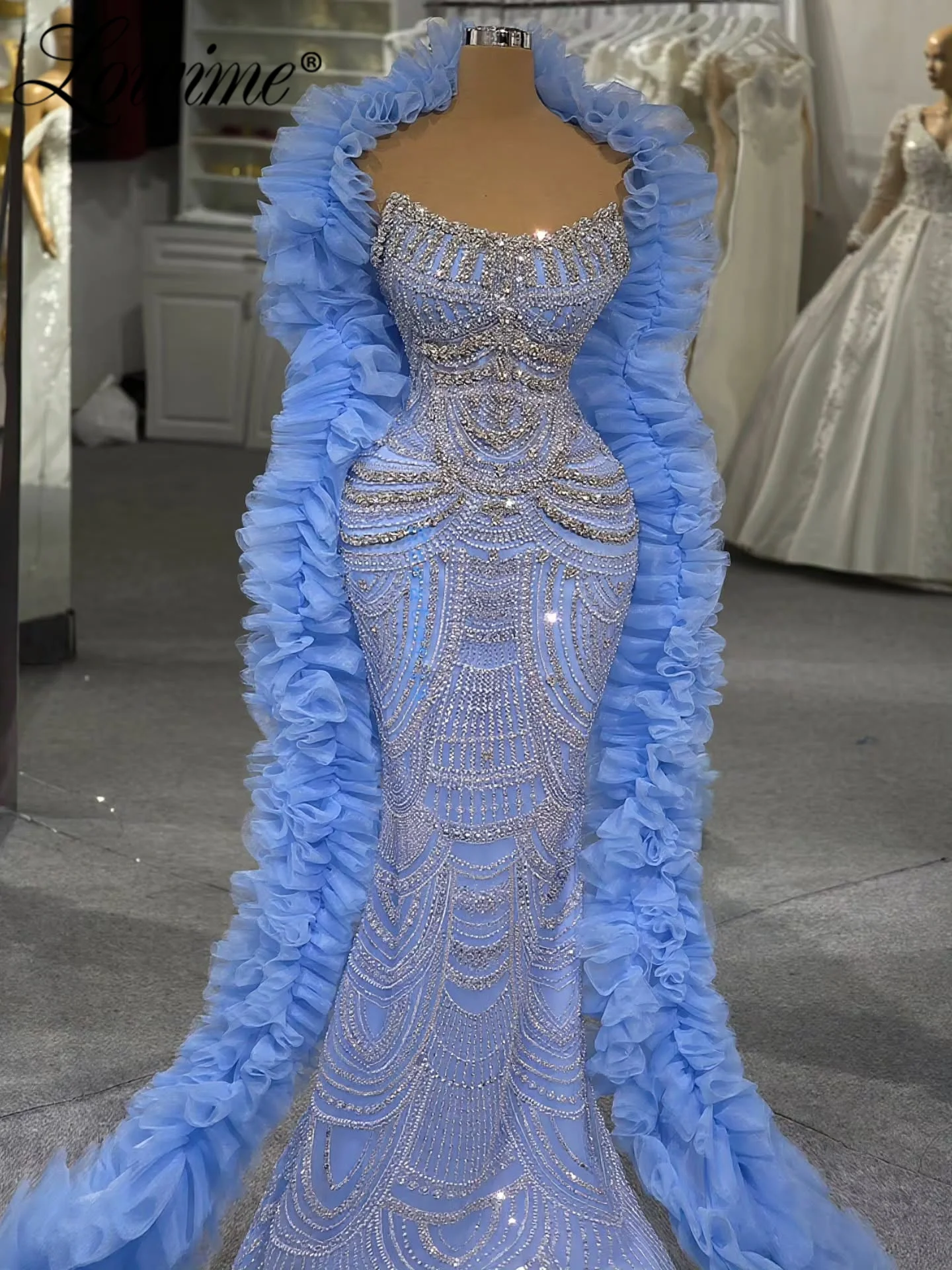 

Customized Blue Ruffles Cape Long Prom Dress Elegant Crystal Celebrity Dresses 2026 Arabic Mermaid Reception Party Evening Gowns