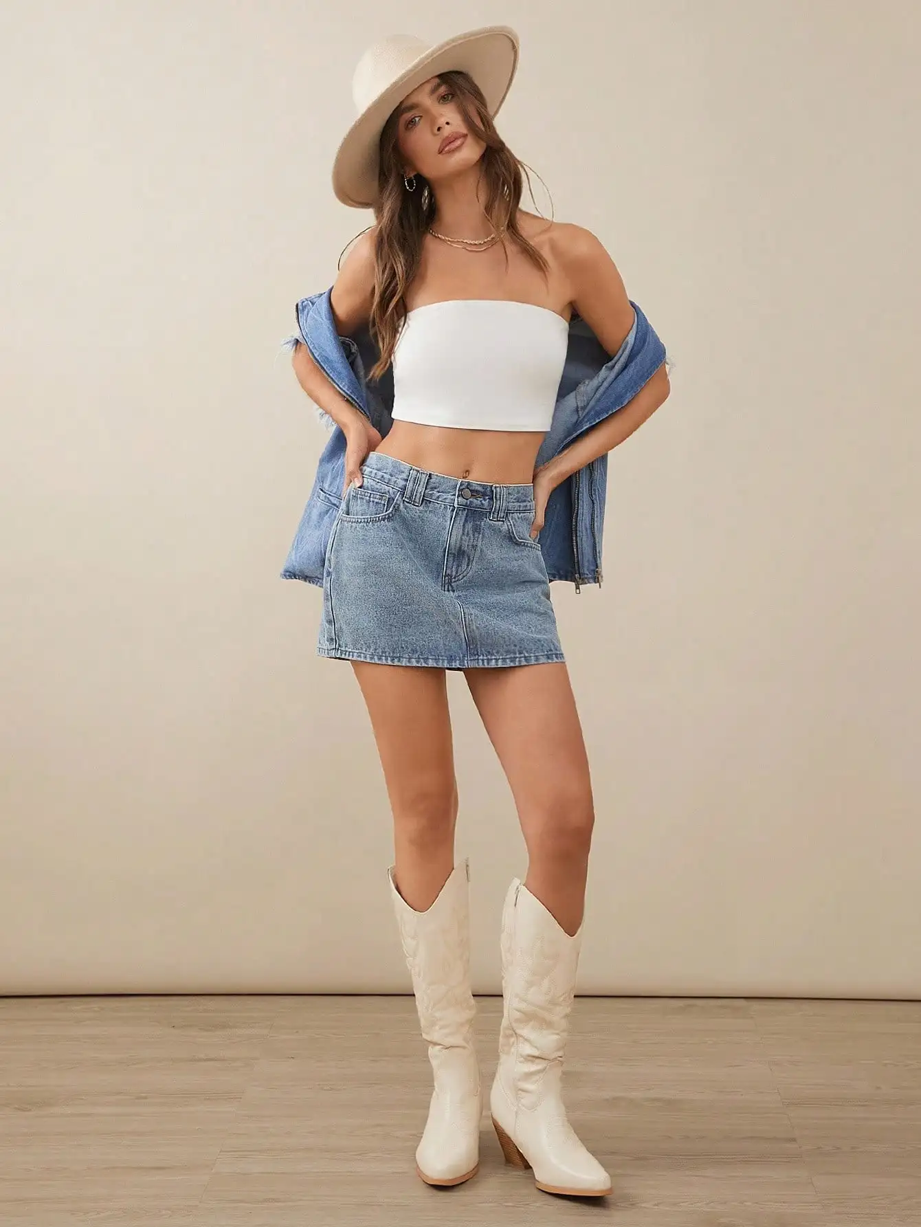 Light Wash Denim Mini Skirt with Front Button Closure and Pockets