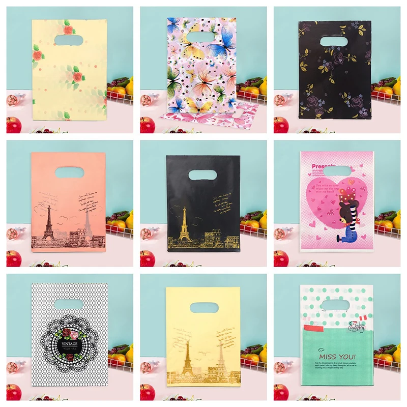 50Pcs/Lot Cheaper More Pattern Jewelry Plastic Bag With Handle 20x30cm Christmas Wedding Gift Thick Gift Shopping Packaging Bags