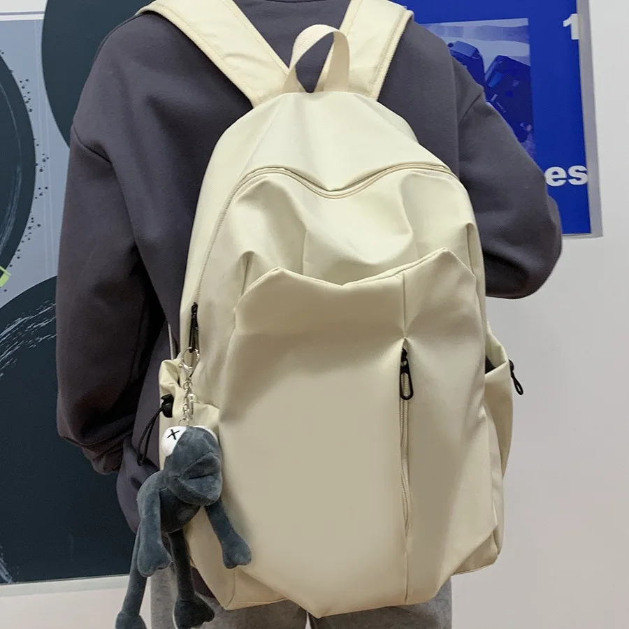 

Simple large capacity ins solid color computer backpack university high school schoolbag Mori campus canvas backpack men and wom