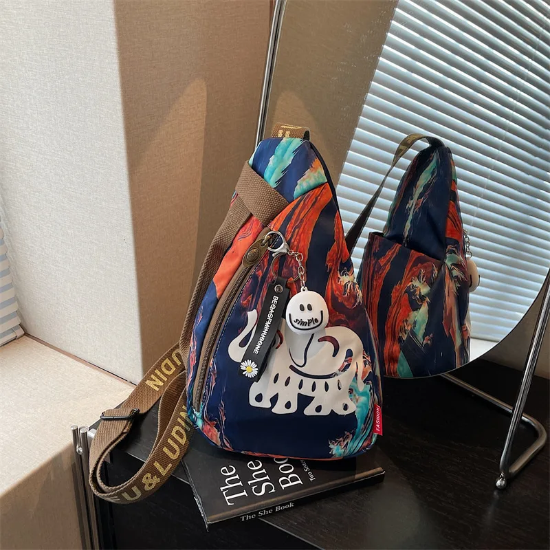 

Winter Fashion Sports Crossbody Cycling Breast Bag Women's 2026 New Niche Design Printed Multi-pocket Shoulder Bag Small Satchel