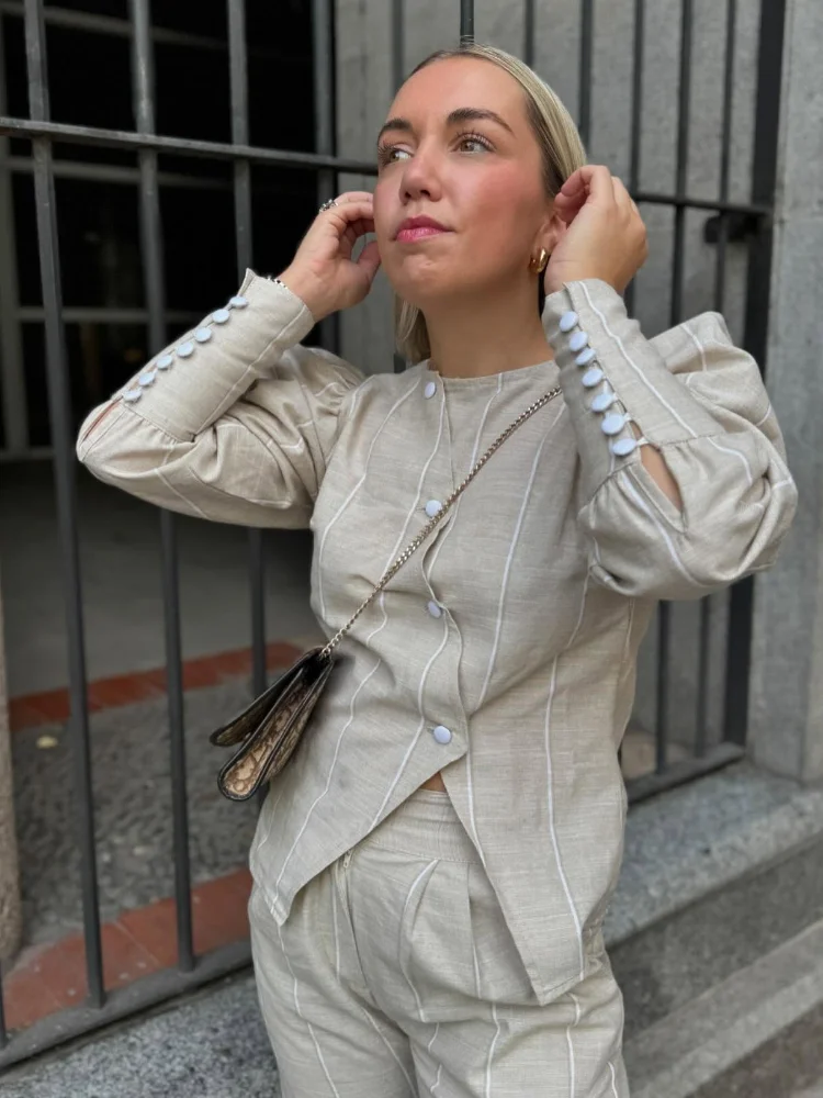 Chic Bubble Sleeve Irregular Slanted Button Shirt Elegant O Neck Stripe Slit Casual Blouse 2025 New Spring Summer Commuter Top