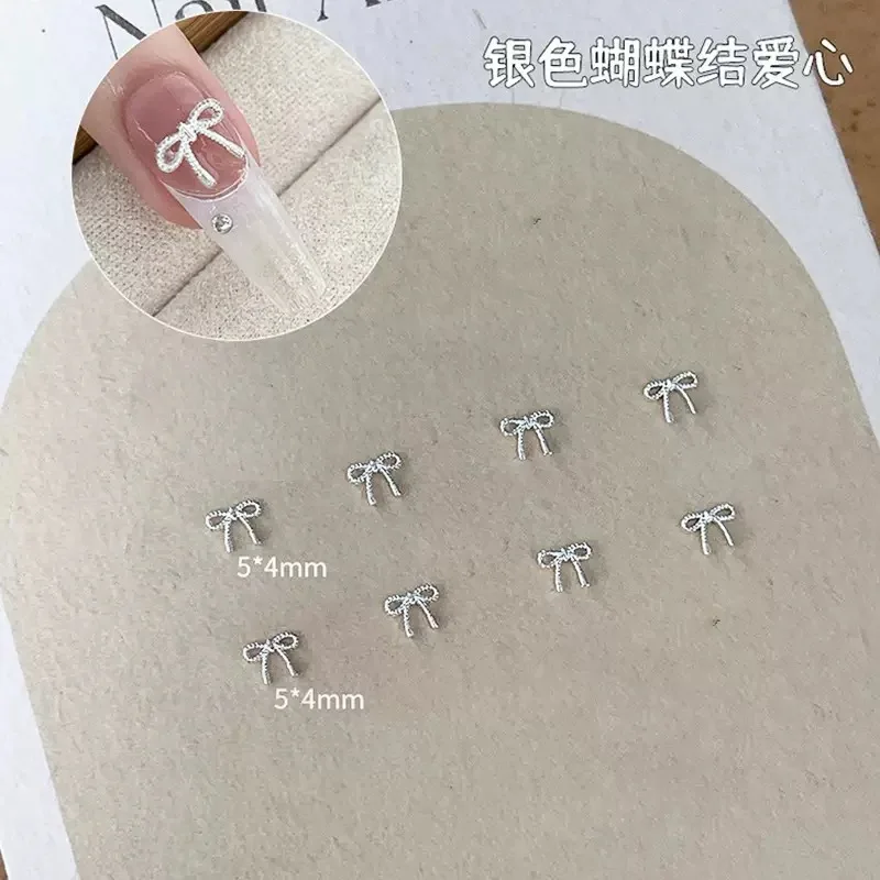 50 pz Lega Arco Cuore Pendenti E Ciondoli Per Unghie Accessori 3D Argento Piccolo Bowkont Ornamenti a forma di Cuore Unghie artistiche Decorazioni Forniture FAI DA TE