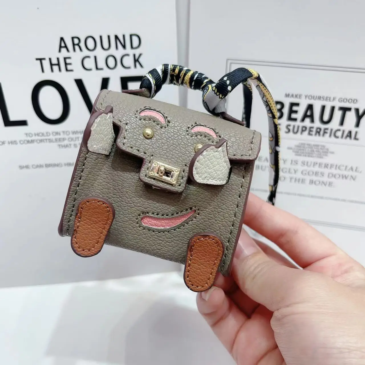 

2025 New! Adorable Mini Kelly Doll - Inspired Bag Charm - Multi - Functional Earphone, Coin Purse, and Keychain - Ideal Car Orna