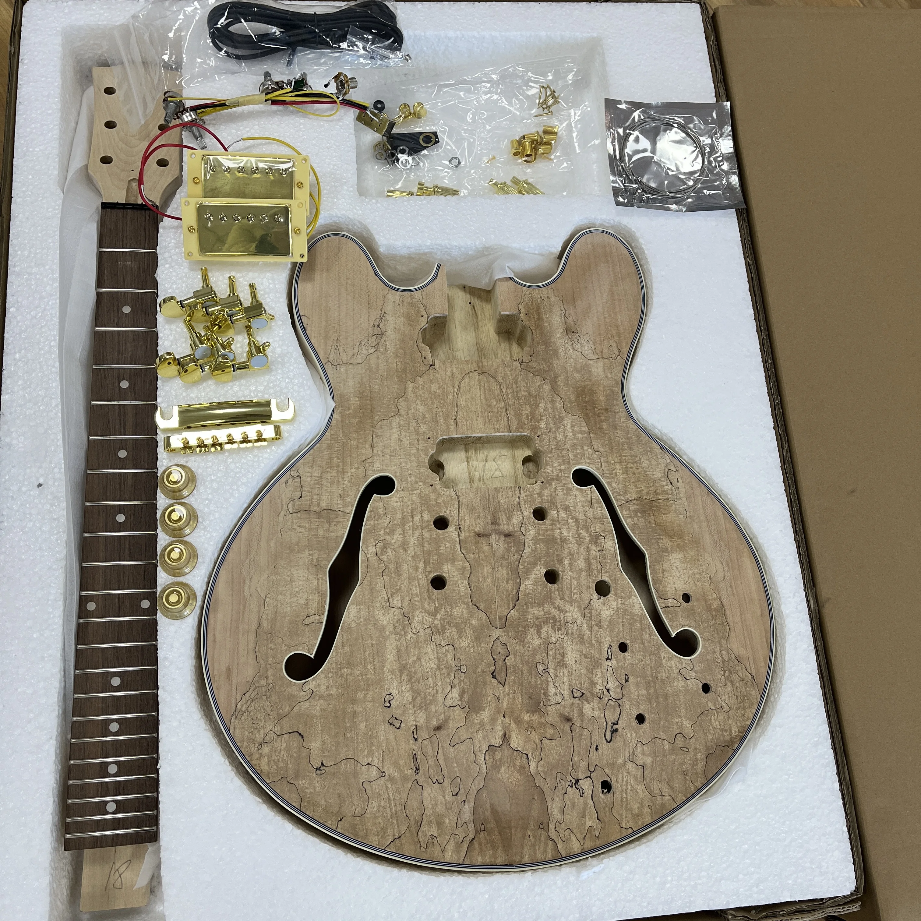 

Хит продаж: Набор для сборки электрогитары DIY Jazz Guitar Kit с полуполым корпусом F-hole и верхней декой из кленового шпона. Бесплатная доставка.