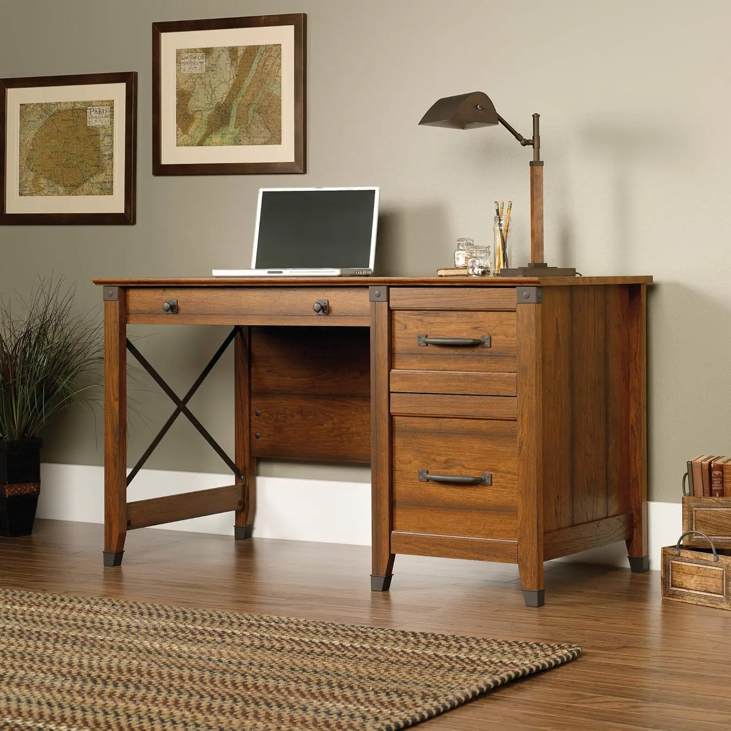 The computer desk has three drawers with metal rails and safety Wrought iron style hardware and accents