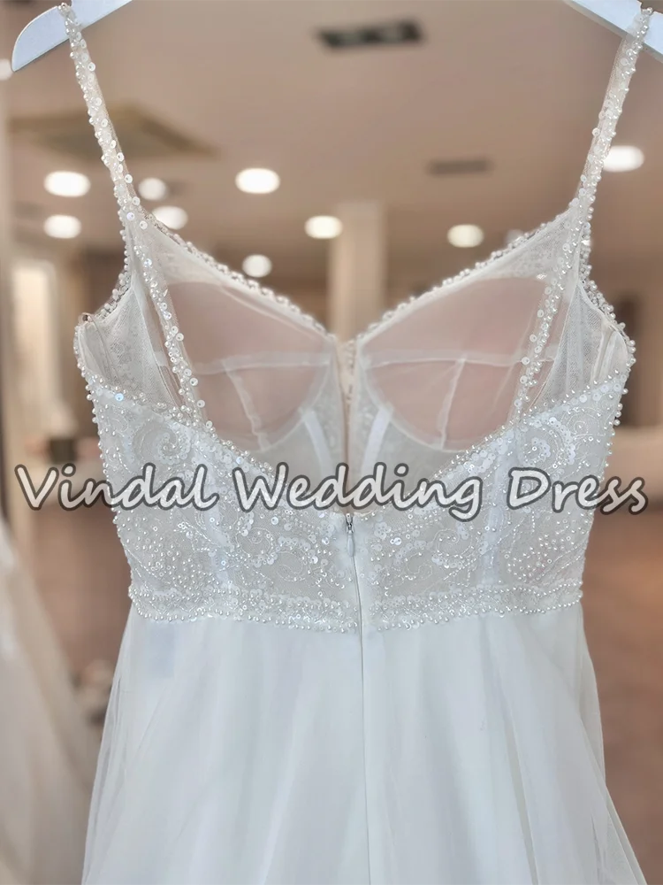 ชุดแต่งงานสายเดี่ยวประดับมุกหรูหราทรงเอไลน์ผ้าทูลล์ รุ่น Vindal Luxury Pearl Beading ปี 2026 สไตล์โบฮีเมียน สำหรับงานแต่งงานแบบเรียบง่าย สามารถสั่งตัดได้