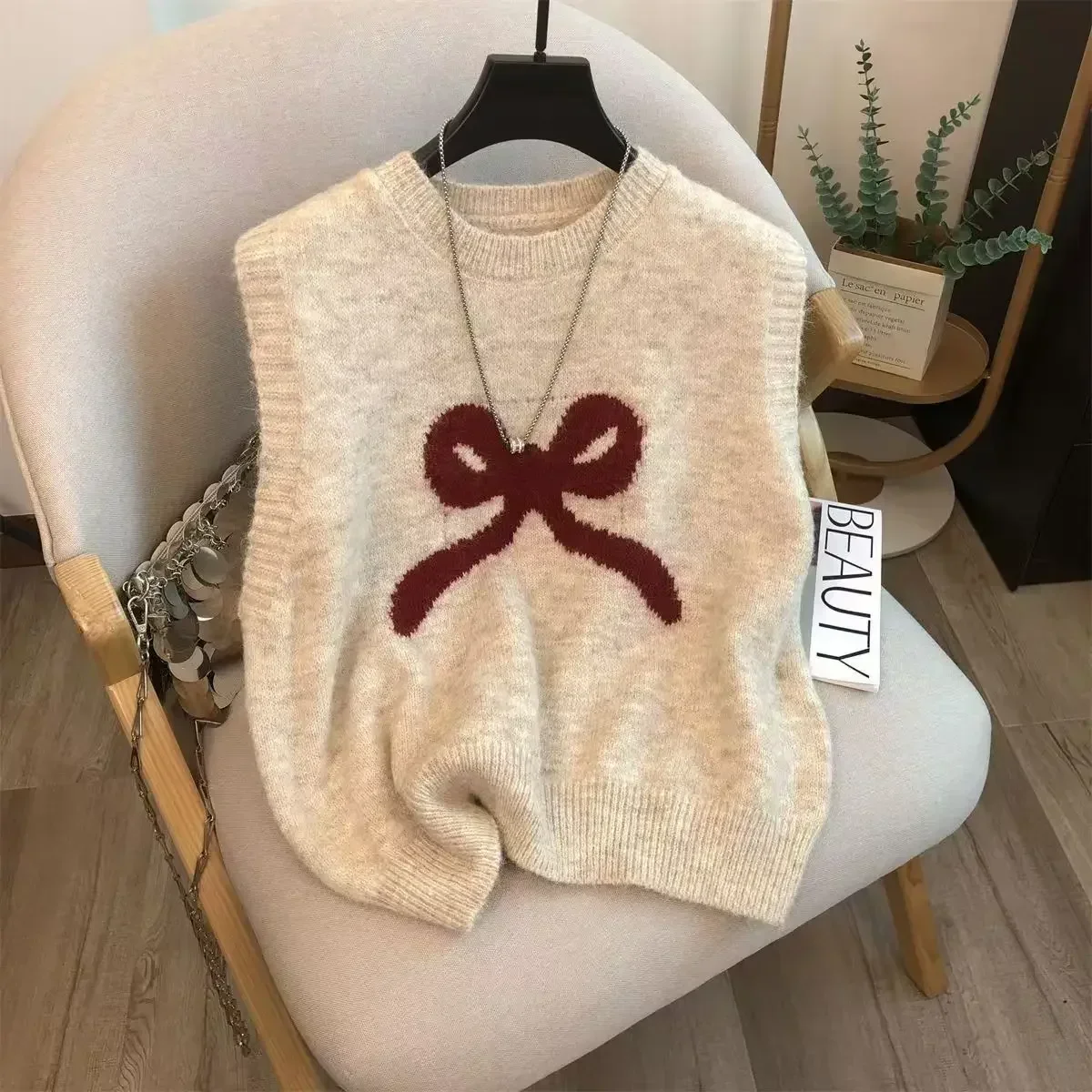 

Корейский стиль, модный и уникальный вязаный жилет, женский 2024, ранняя осень, бретелька с бантом, мягкая меховая рубашка, универсальный топ