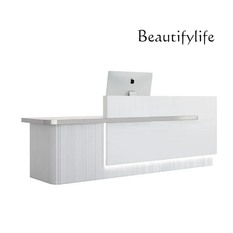 

Simple and modern company front desk, special-shaped bar counter, painted white desk