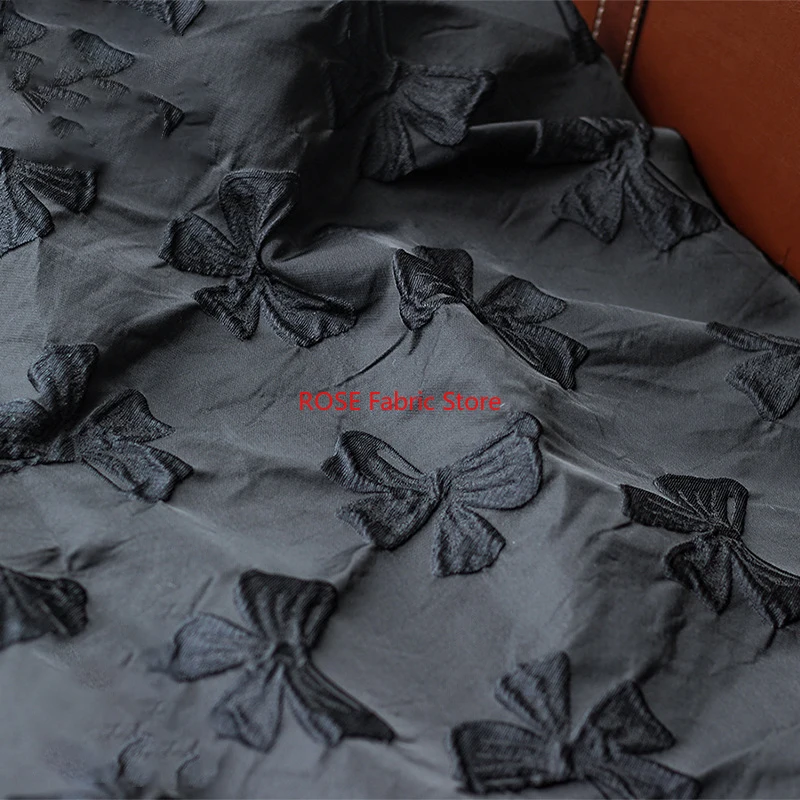 1 Meter Yarn Dyed Embossed Black Bow Jacquard Fabric Stiff Polyester Autumn and Winter Jacquard Dress Fabric