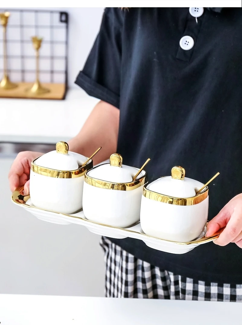 شمال أوروبا الخفيفة الفاخرة الأبيض بنوم بنه السيراميك علبة السكر وعاء الملح بهار أربع قطع تخزين شاي بالأعشاب المزهرة