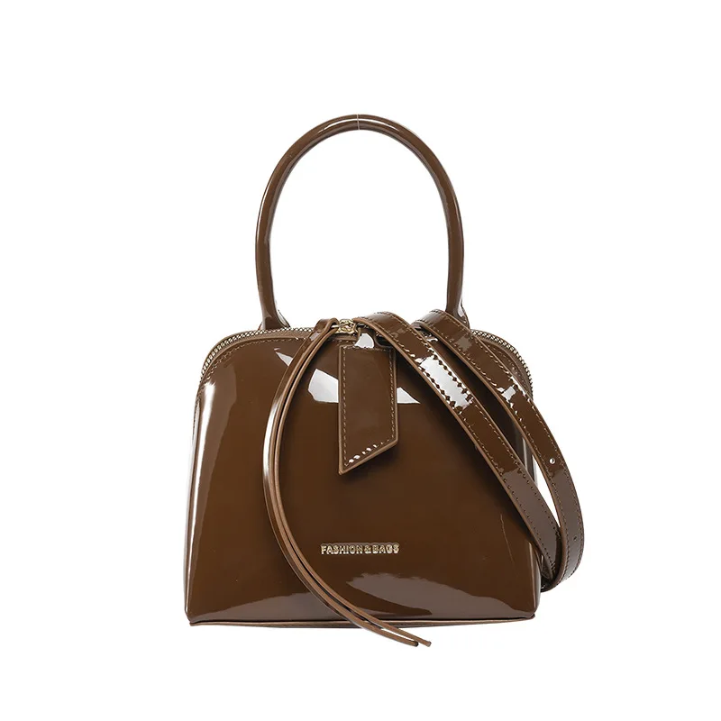 

﻿ High end shell bag women's trendy handbag with glossy design simple and atmospheric single shoulder crossbody bag