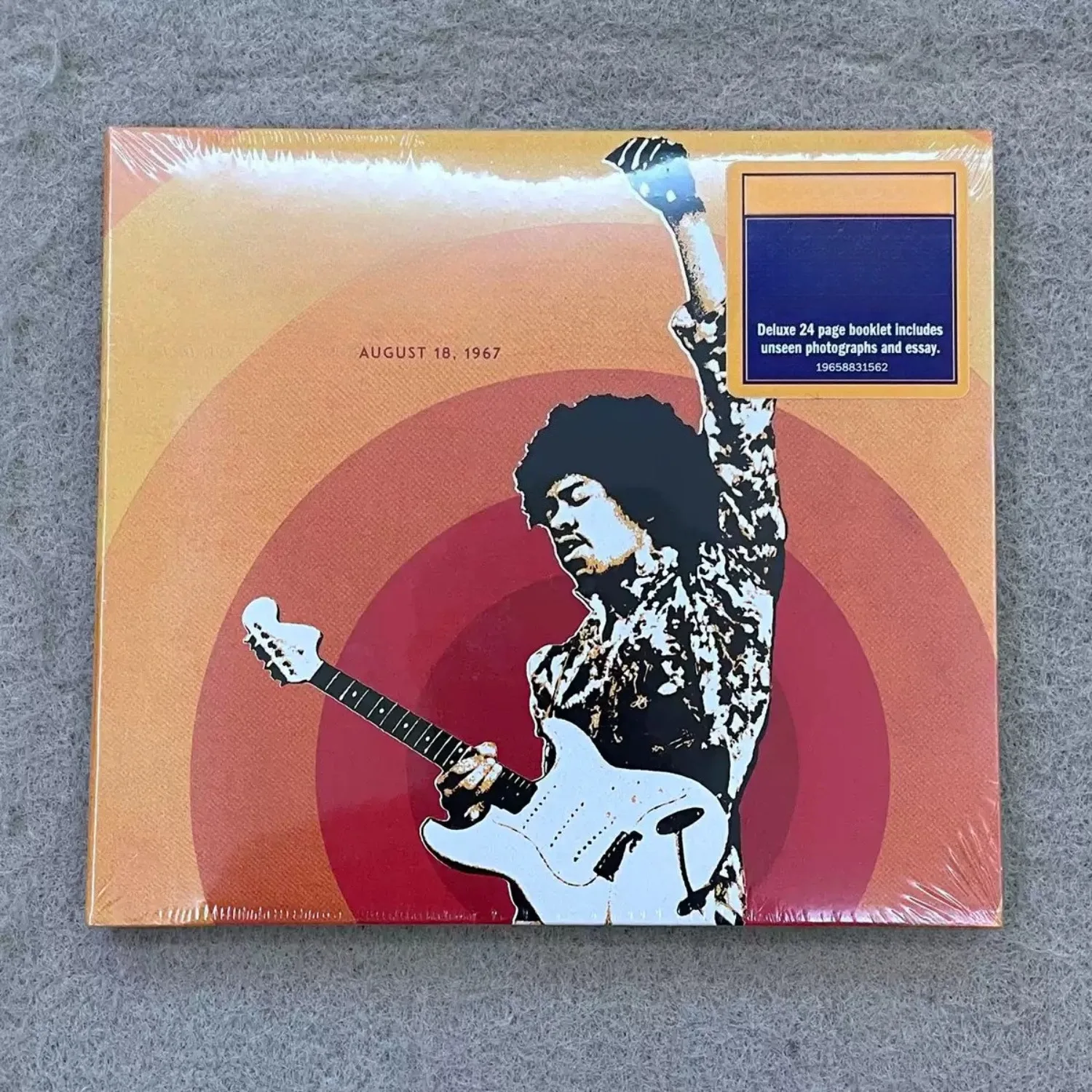 CD de musique Rock classique édition live, couverture avec portrait de guitariste Pop Art orange-rouge, collection de morceaux improvisés sur scène légendaires