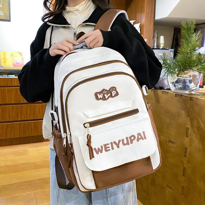 Nylon lightweight color-blocking student schoolbag, large-capacity travel backpack, multi-layer waterproof backpack