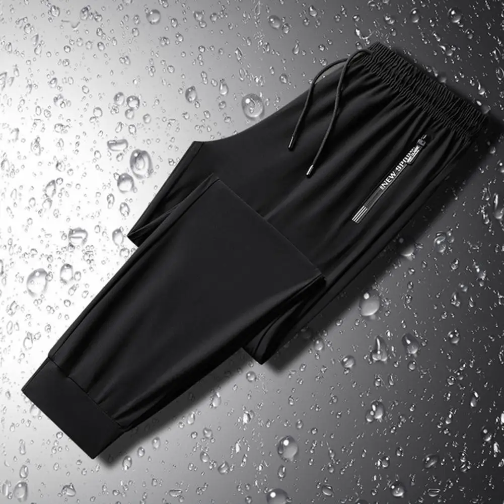 

Drawstring Trousers Elastic Waist Pants Men's Quick-drying Ice Silk Sport Pants with Zipper Pockets Drawstring Waist Breathable