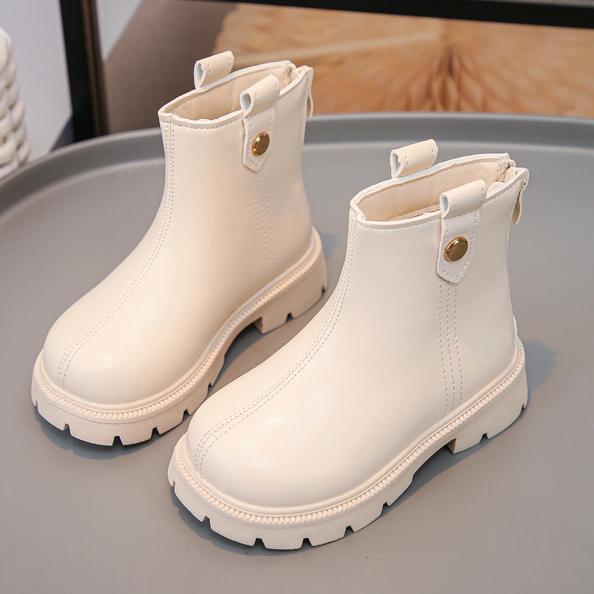 A Pair of Classic, Simple and Versatile Beige Autumn and Winter Boots for Girls
