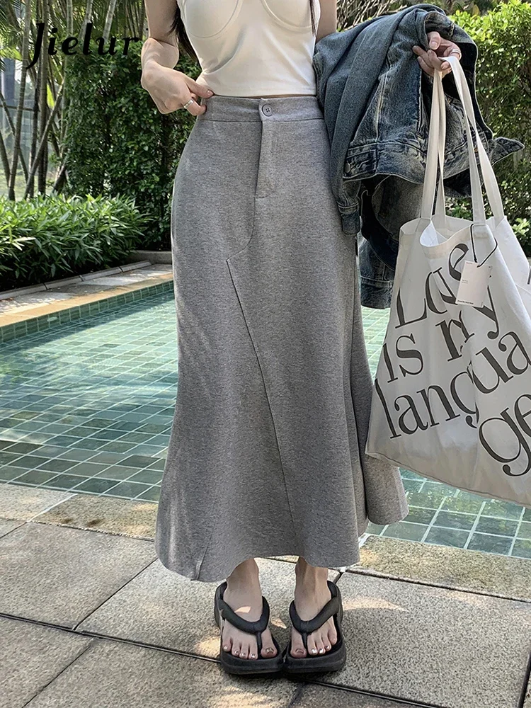 

Jielur Spring New Women's Irregular Minimalist Half Skirt Fashion Spliced Elastic Waist Women Zipper Solid Color Fishtail Skirt