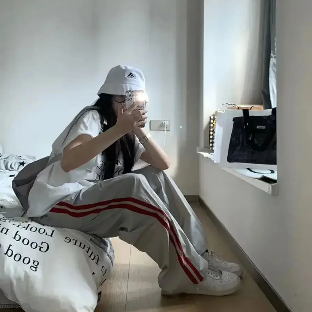 กางเกงกีฬาลายทางหลวมๆ ลำลองสำหรับผู้หญิง กางเกงคาร์โก้บางสำหรับฤดูใบไม้ผลิและฤดูใบไม้ร่วง แจ๊สลำลอง สตรีทแดนซ์ ฮิปฮอป