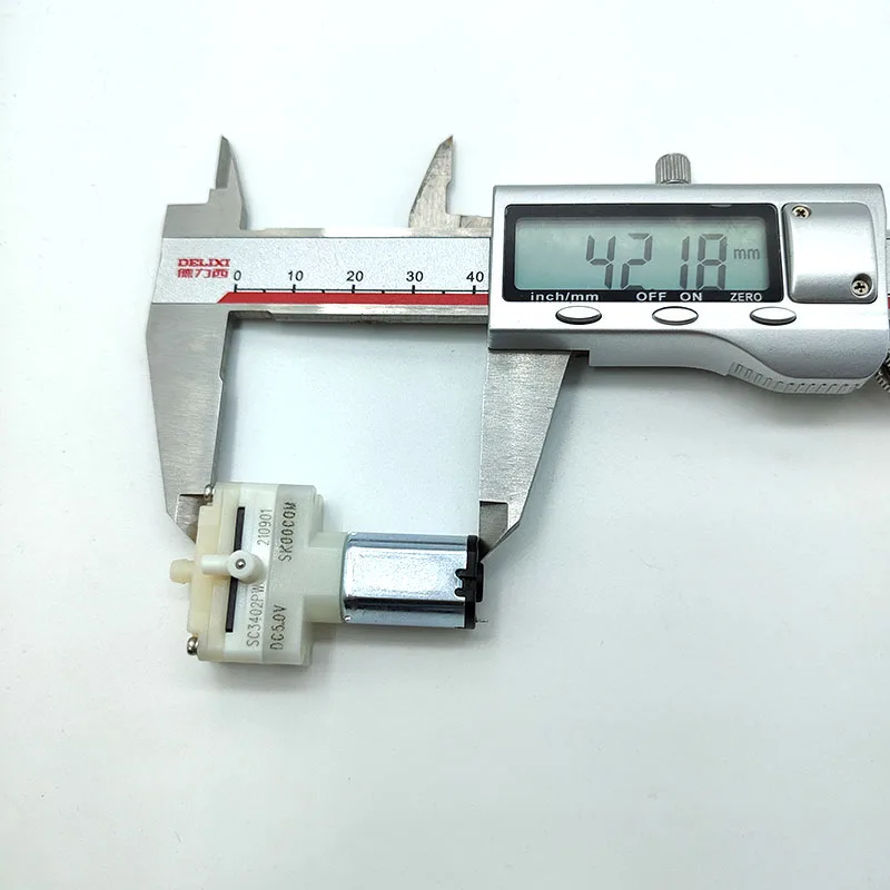 

SKOOCOM SC3402PW Mini Vacuum Pump DC 5V Micro 031 Motor Diaphragm Air Oxygen Negative Pressure Suction Pump for Electronics