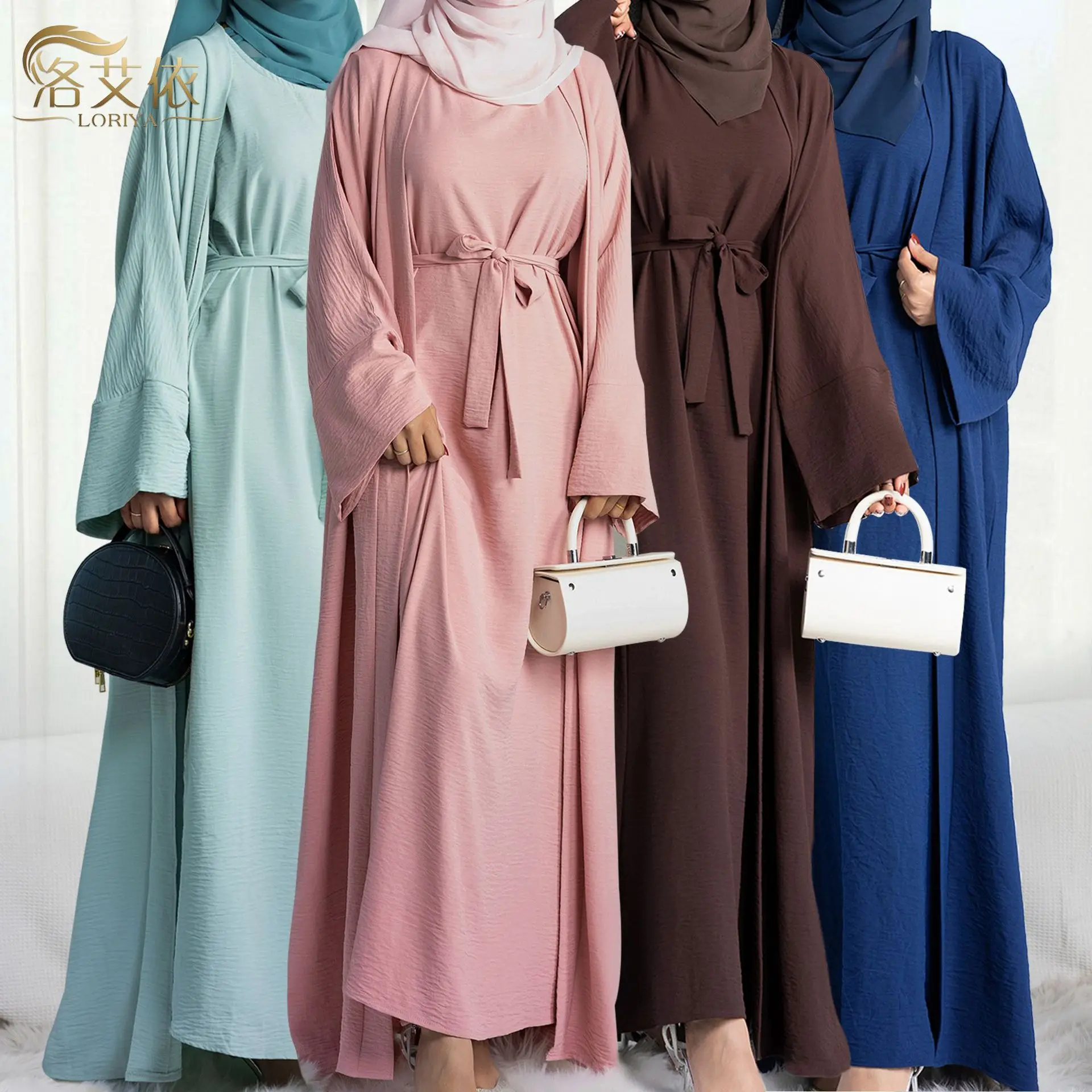 

Женский однотонный комплект из двух предметов: повседневный летний льняной комплект из двух частей в турецком/дубайском стиле, состоящий из укороченного топа с коротким рукавом и брюк.