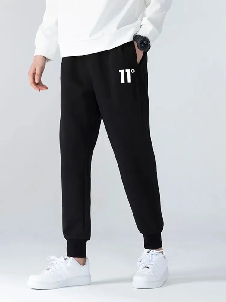 Męskie spodnie dresowe z nadrukiem Paris 2025, nowy styl, jesienno-zimowe, modne spodnie męskie, streetwear, codzienne, wygodne spodnie do noszenia w domu dla mężczyzn.