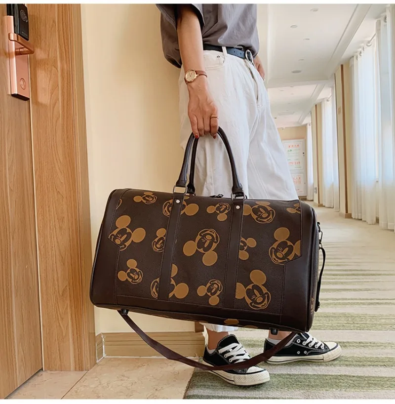 Disney-bolso de viaje de Mickey para hombre y mujer, bolsa de equipaje de gran capacidad, bandolera de un solo hombro, novedad de 2023