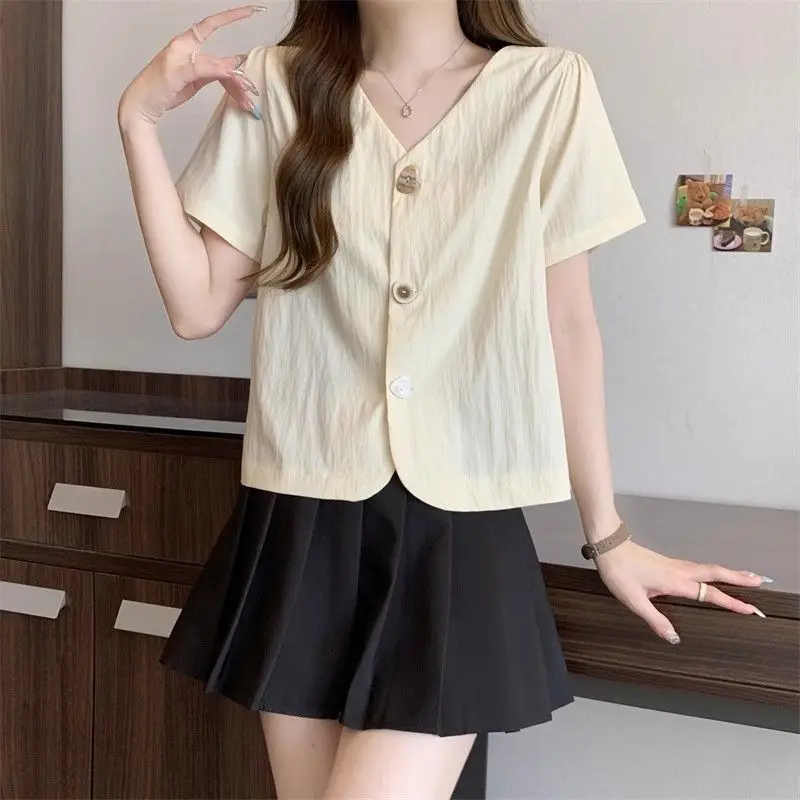 新しい中国風の夏の新しい女性のブラウスカジュアル多用途ボタンカーディガン V ネック半袖トップ