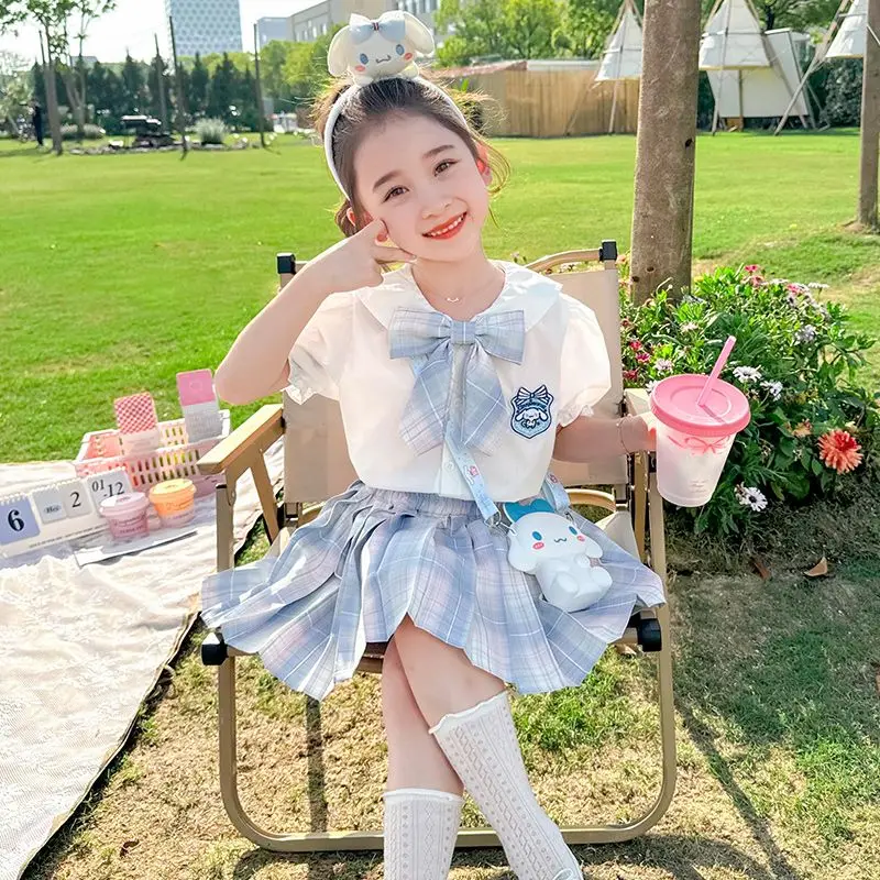 

2024 Girls Summer Cinnamoroll Jk 2Pcs Set Kawaii Sanrio Anime Children Plaid Skirt Sweet Cute Cartoon Shirt Tops Gift for Kids