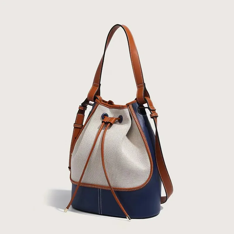 Trend niche design contrasting color canvas bucket bag high-end fashion simple shoulder bag large capacity cross-body bag