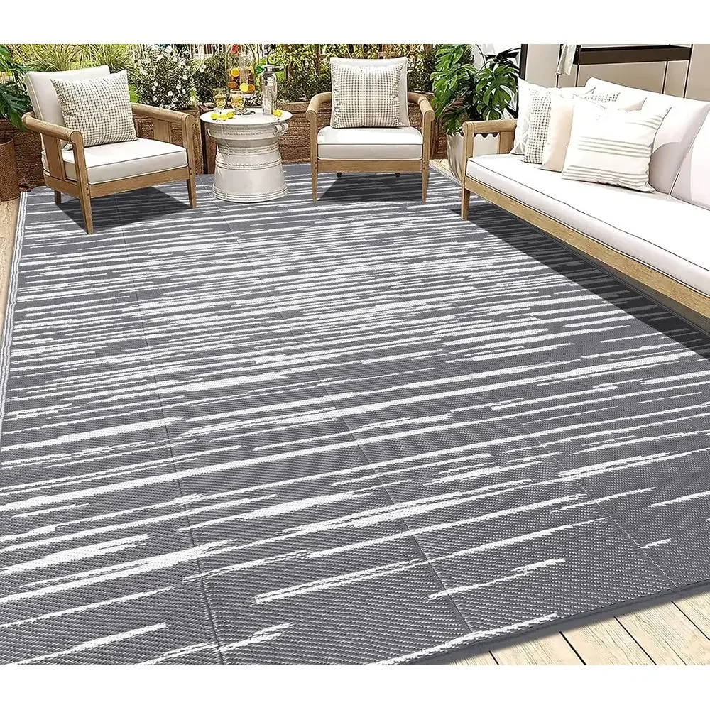 

Водонепроницаемый двусторонний уличный коврик 5x8 для патио, кемпинга и террас - идеально подходит для автодомов, пикников, задних дворов и веранд. Ограниченное предложение.