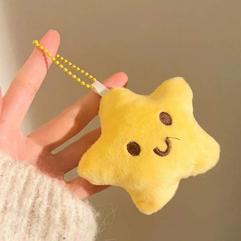 Piepende pluche ster sleutelhanger hanger hanger meisje rugzak decoratieve hanger schattige pop met sieraden