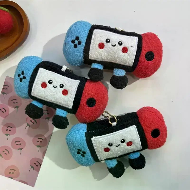 1 szt. Uroczy, zabawny pluszowy breloczek w kształcie konsoli do gier, miękka wypchana zawieszka do plecaka, ozdoba do torby, ozdoba dla par, zabawka do gryzienia dla zwierząt, prezent.