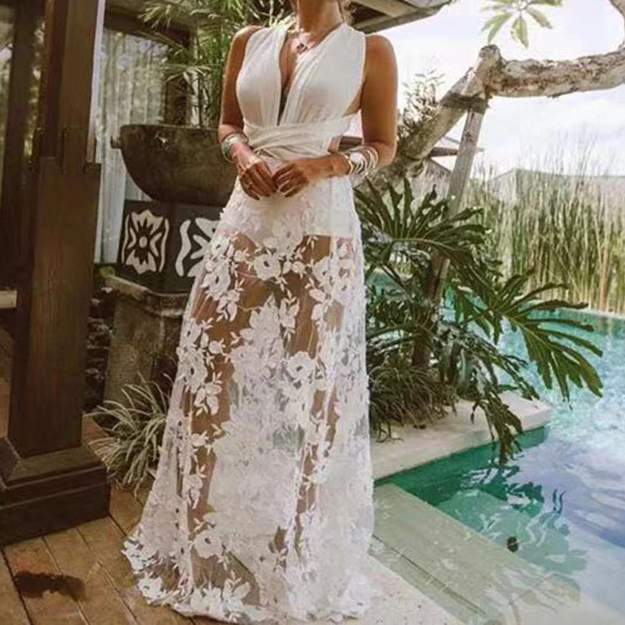 

Sexy Dress with Deep V-neck, Lace, and Hollow-out Beach Skirt. Summer 2025 New European Women's Fashion Dress