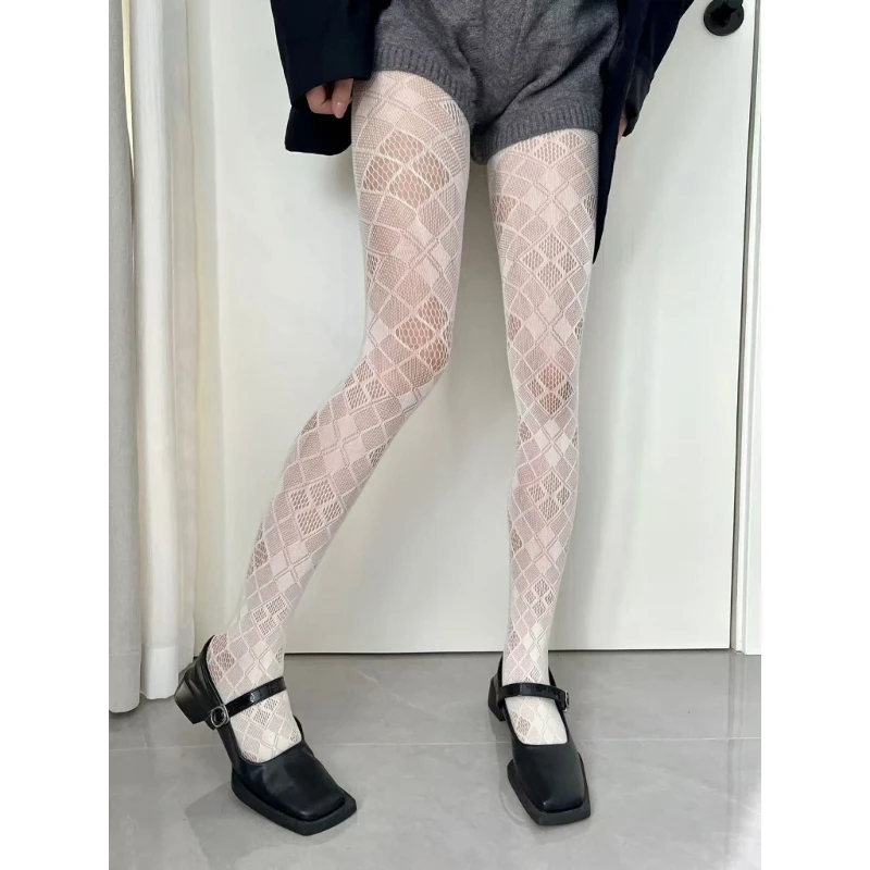 جوارب نسائية حلوة من شبكة صيد السمك جوارب شبه شفافة جوارب أنيقة مجوفة من قماش الجاكار بلون واحد جوارب طويلة ضيقة