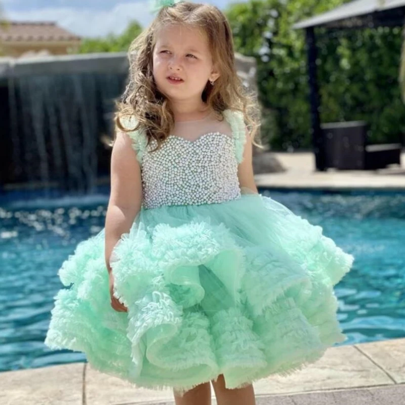 Abiti da ragazza di fiori verdi Tulle Puffy Tiered Pearl Top con fiocco senza maniche per abiti da principessa per banchetti di festa di compleanno di nozze