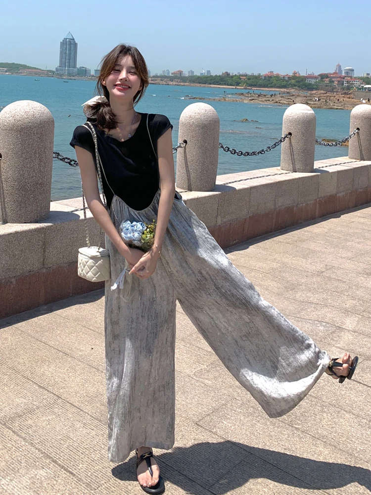

Elegant Tie-Dye Halter Wide Leg Pants Set Women's Summer 2026 New Style Black Short Sleeve T-Shirt Romper Two-Piece Suit