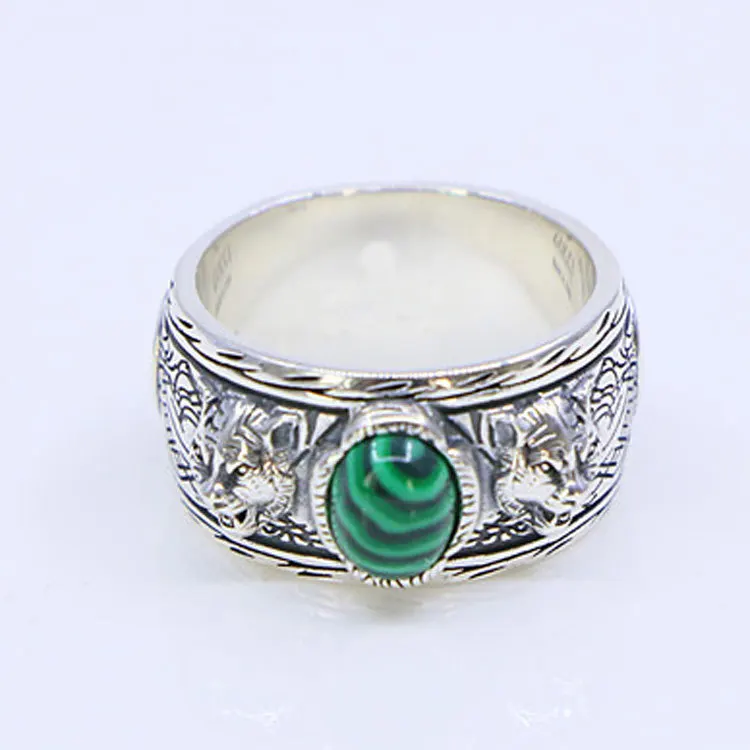 

Sterling silver inlaid with green agate double tiger head ring, retro British style, European and American noble jewelry, trendy