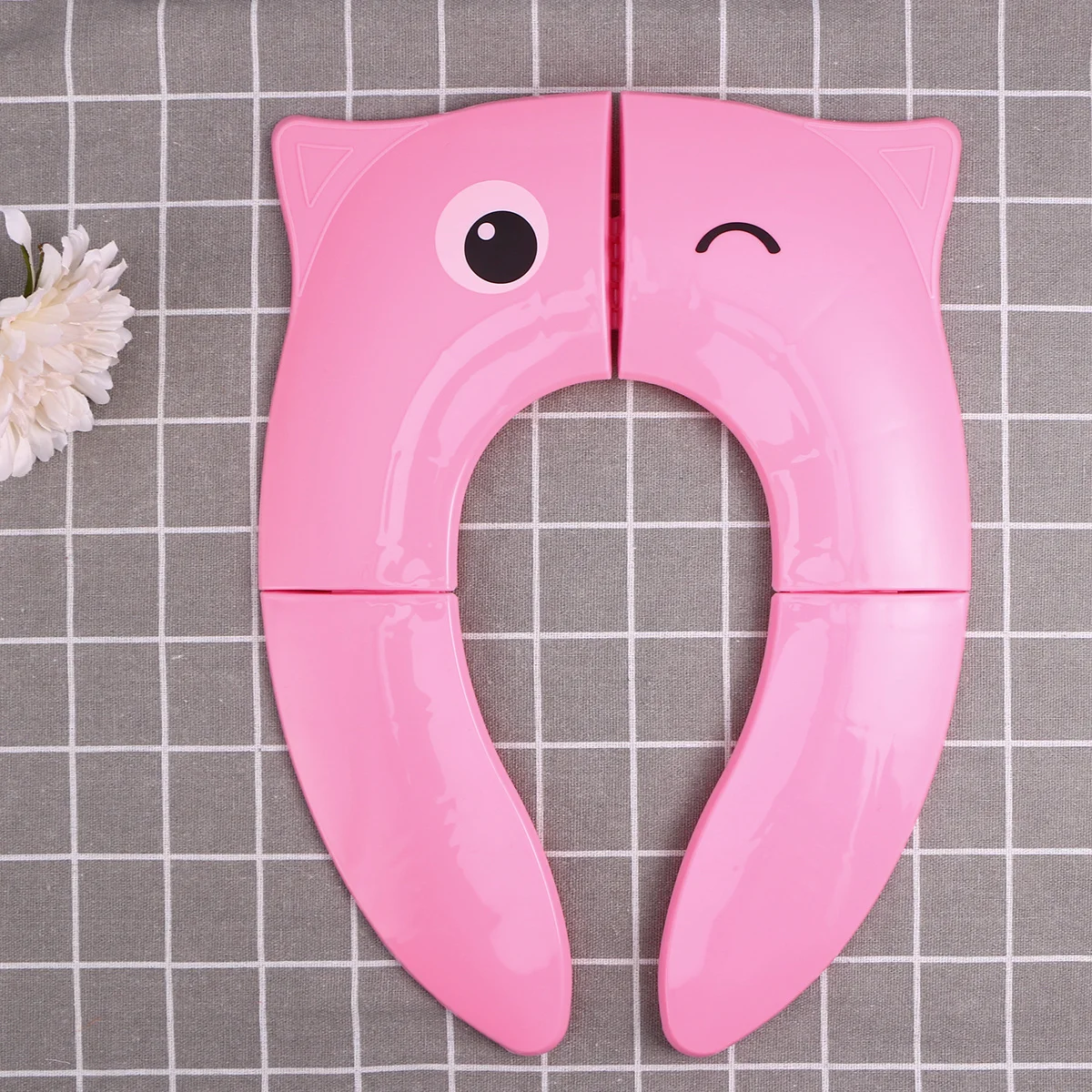 Składane, lekkie i przenośne nakładki na sedes do użytku w podróży, w domu, zimowe, dla dzieci, z motywem małych oczek, różowe.