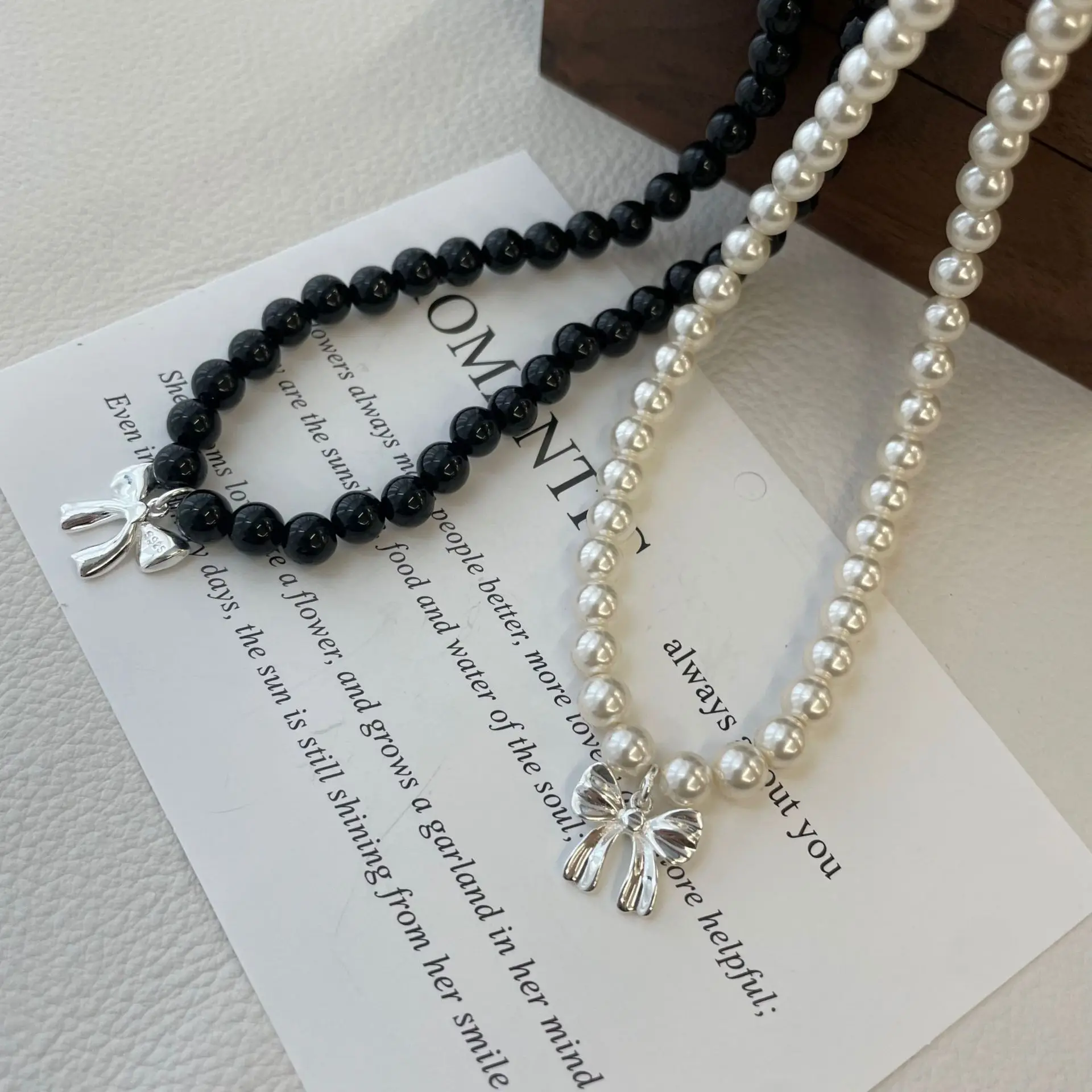 

S925 pure silver agate pearl bow necklace ins temperament high-end sense niche design versatile and simple