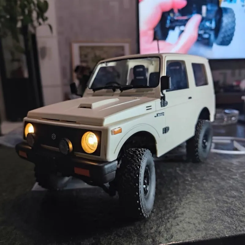 

RC 1/10 Jimny Wpl C74 2.4g Full-Scale Warrior Ja11 4wd Climbing Track Remote Control Car Model Children'S Remote Control Toy