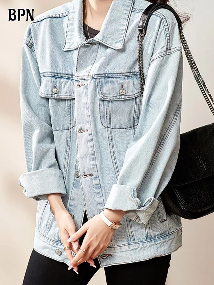 

BPN Patchwork Single Breasted Vintage Denim Coat For Women Lapel Long Sleeve Spliced Pocket loose Streetwear Jacket Female Style