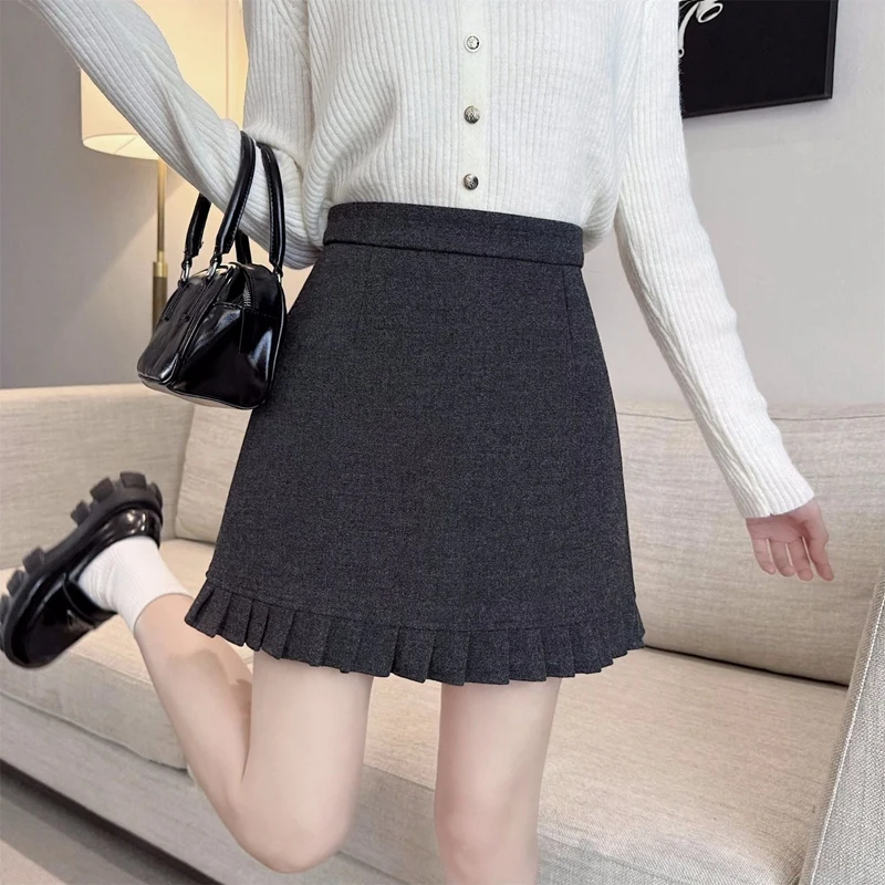 تنانير مزيج الصوف السميك الدافئ لخريف وشتاء 2025 للنساء تنورة كورية لطيفة عالية الخصر بقصة ضيقة ومزاجية فستان أنيق