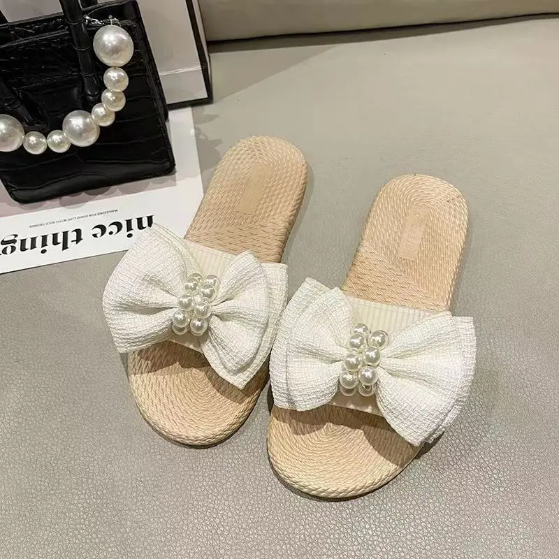 

2024 Summer New Woman's Bow Flat Sole One Word Slipper Soft Sole Non Slip Anti Odor Home Slippers Outdoor Beach Slippers