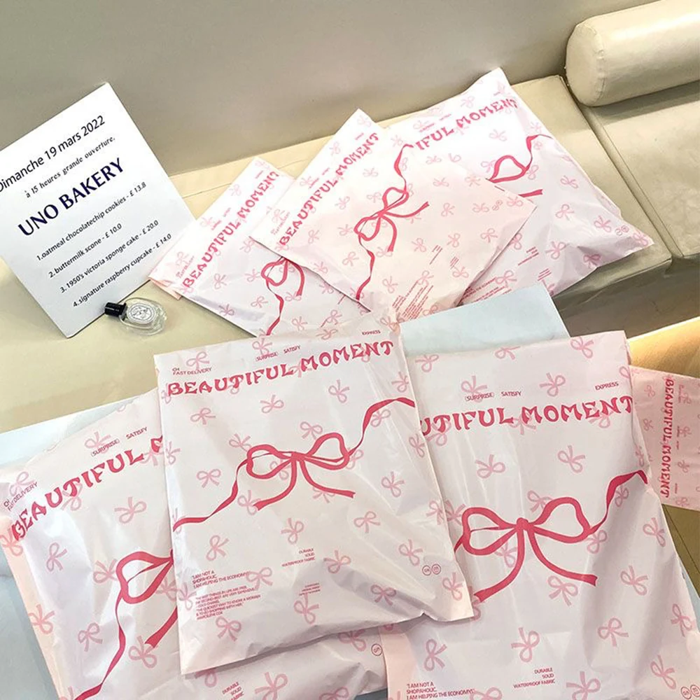 100Pcs/Lot Large Courier Bag Light Pink Plastic Express Envelope Bow Printed Poly Mailers Logistics Packing Bags Clothes Pouches