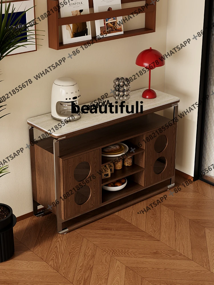 

In the side cabinet, the antique solid wood rock slab is integrated with storage against the wall. Household storage side